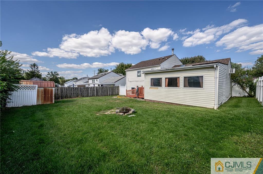 7 Florence Drive Sayreville, NJ 08859 - Photo 39 of 42 a view of a house with a backyard