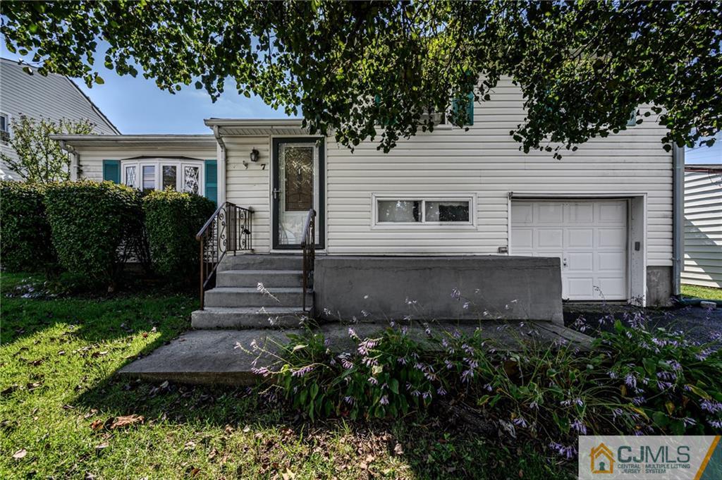 7 Florence Drive Sayreville, NJ 08859 - Photo 41 of 42 a front view of a house with garden
