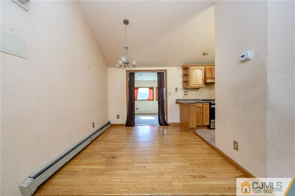 7 Florence Drive Sayreville, NJ 08859 - Photo 7 of 42 a view of a kitchen with a sink and a stove top oven