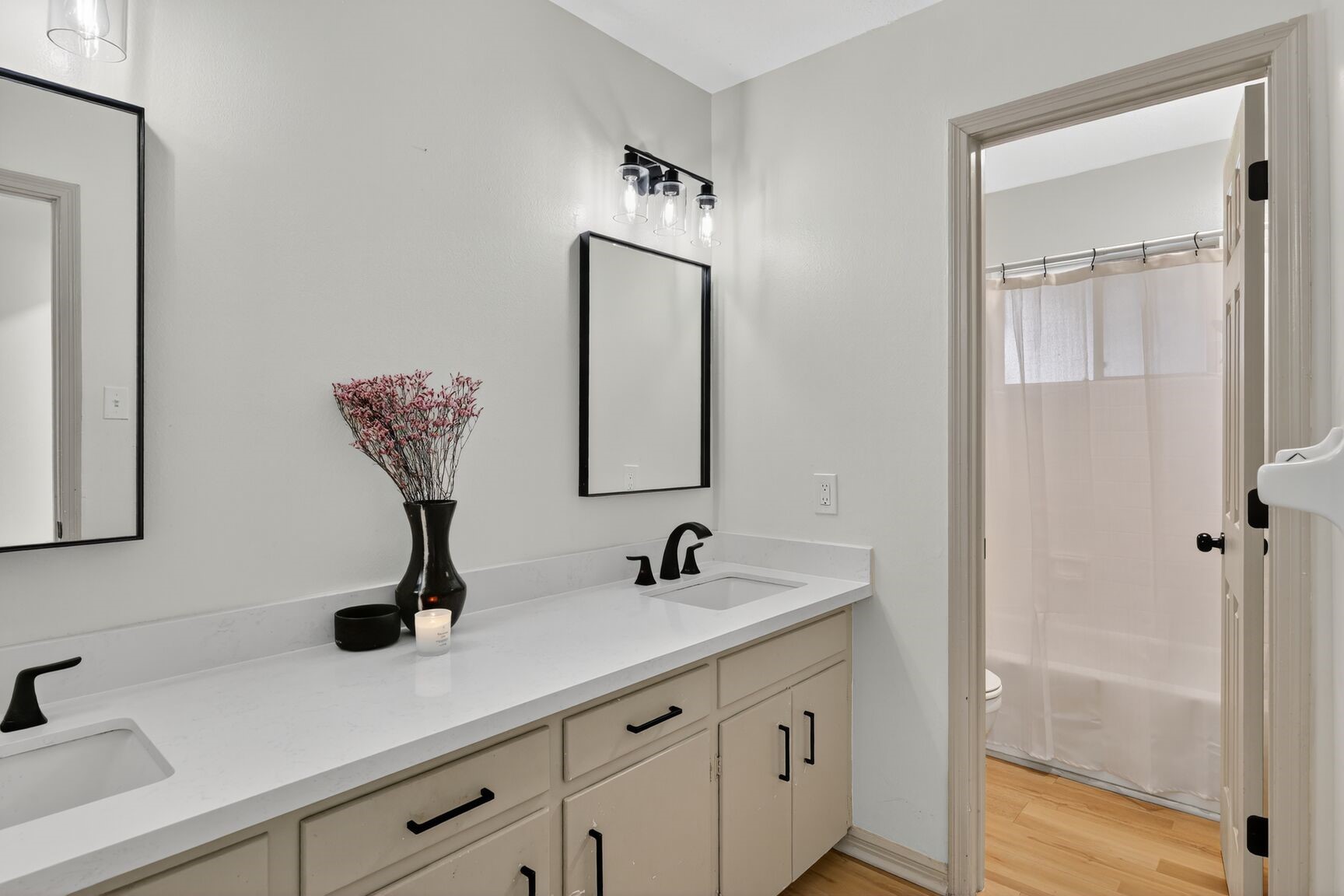 16122 Rill Lane Houston, TX 77062 - Photo 12 of 23 a bathroom with a sink and a mirror