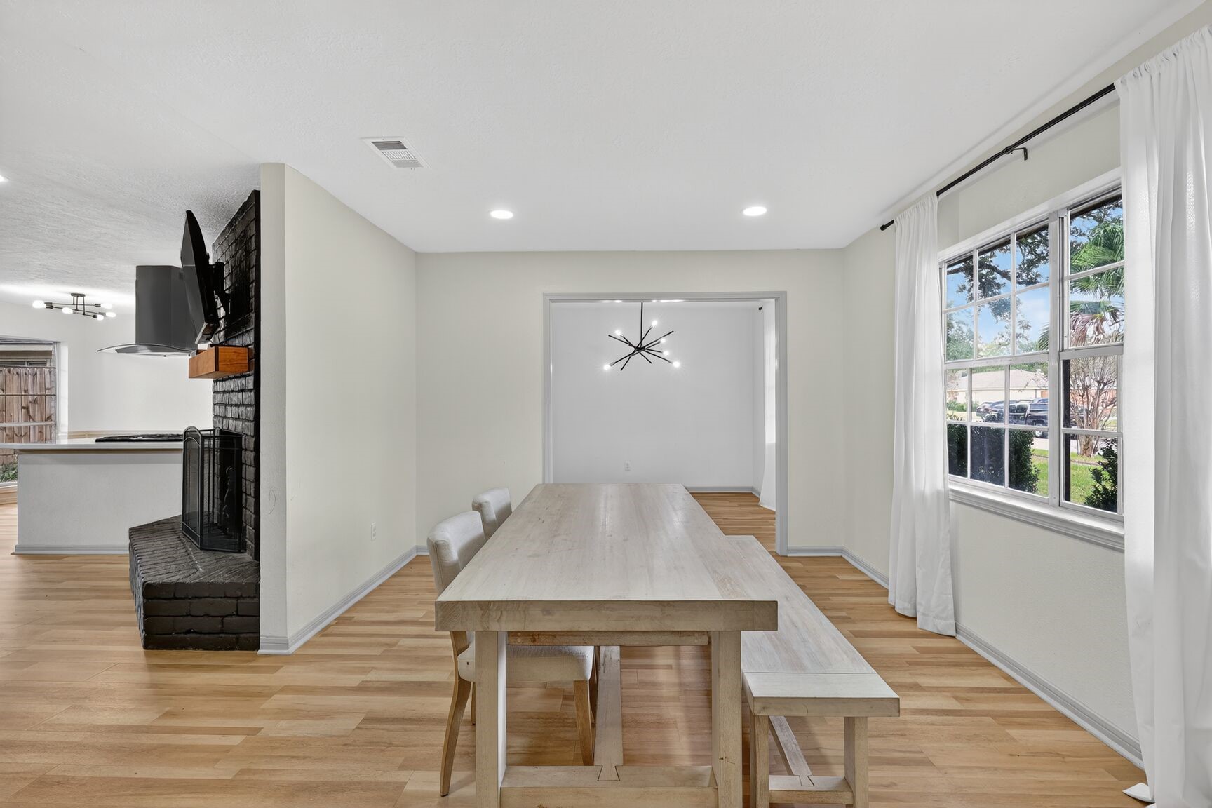 16122 Rill Lane Houston, TX 77062 - Photo 3 of 23 a view of a livingroom with furniture window and wooden floor