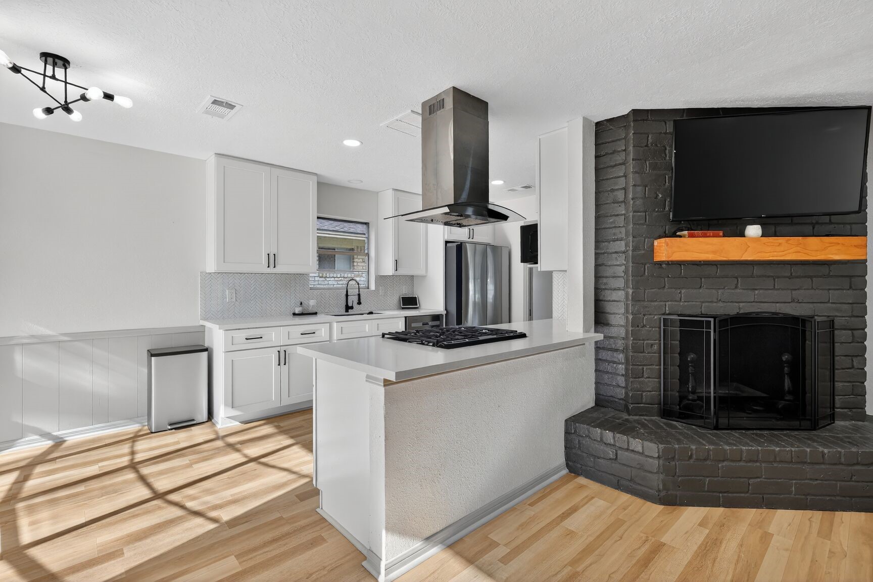 16122 Rill Lane Houston, TX 77062 - Photo 8 of 23 a kitchen with stainless steel appliances granite countertop a stove top oven and cabinets