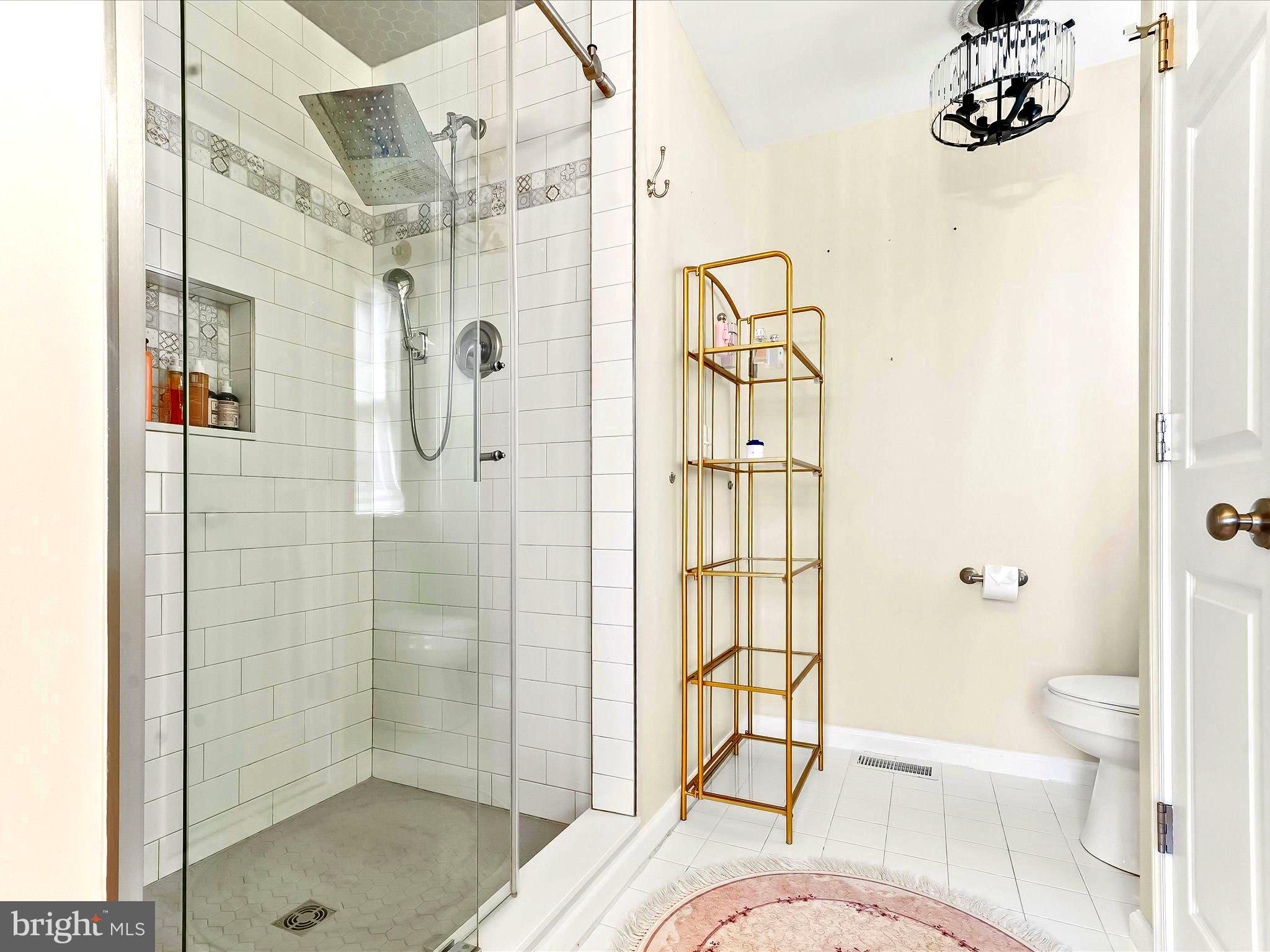 3033 Honeymead Road Downingtown, PA 19335 - Photo 35 of 47 a bathroom with a sink toilet and shower