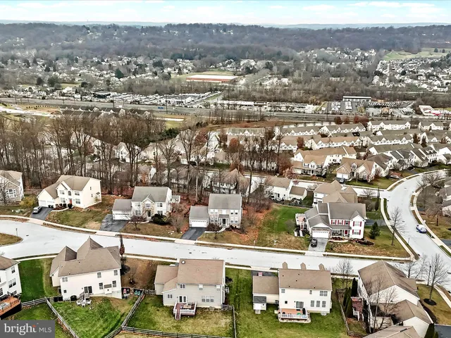 an aerial view of a city with lots of residential buildings