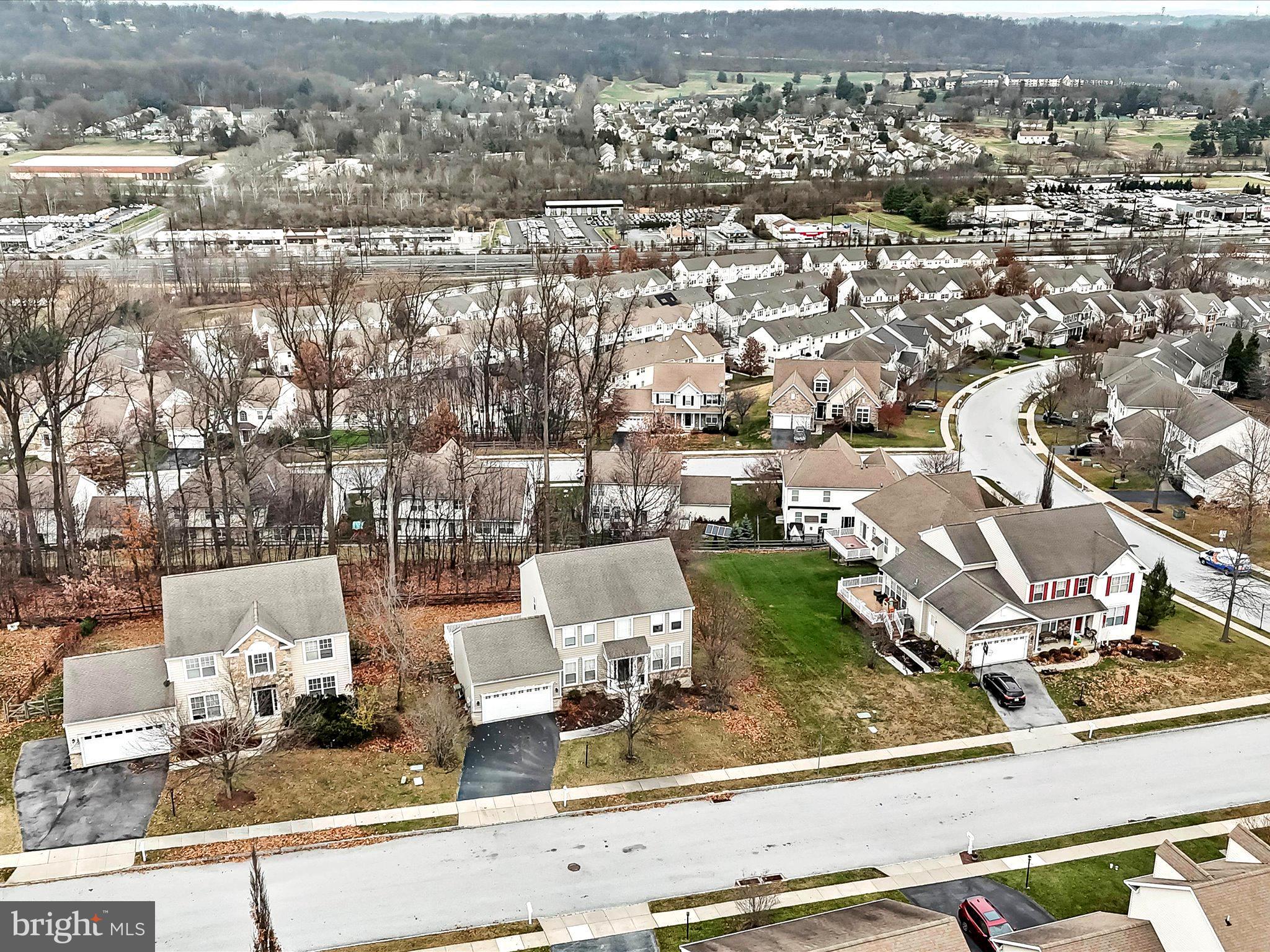 3033 Honeymead Road Downingtown, PA 19335 - Photo 46 of 47 an aerial view of a city with lots of residential buildings