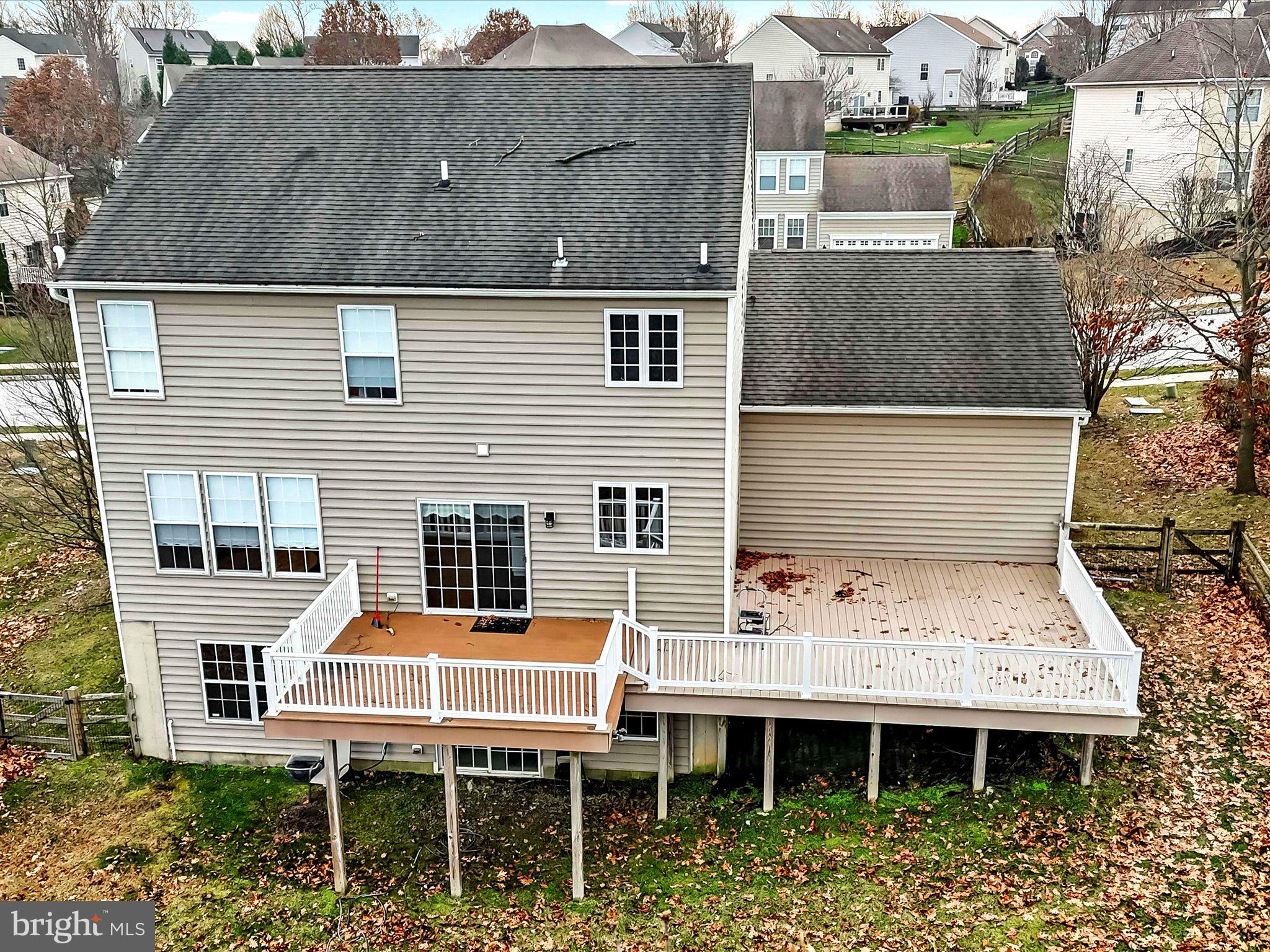 3033 Honeymead Road Downingtown, PA 19335 - Photo 7 of 47 a view of a patio with table and chairs