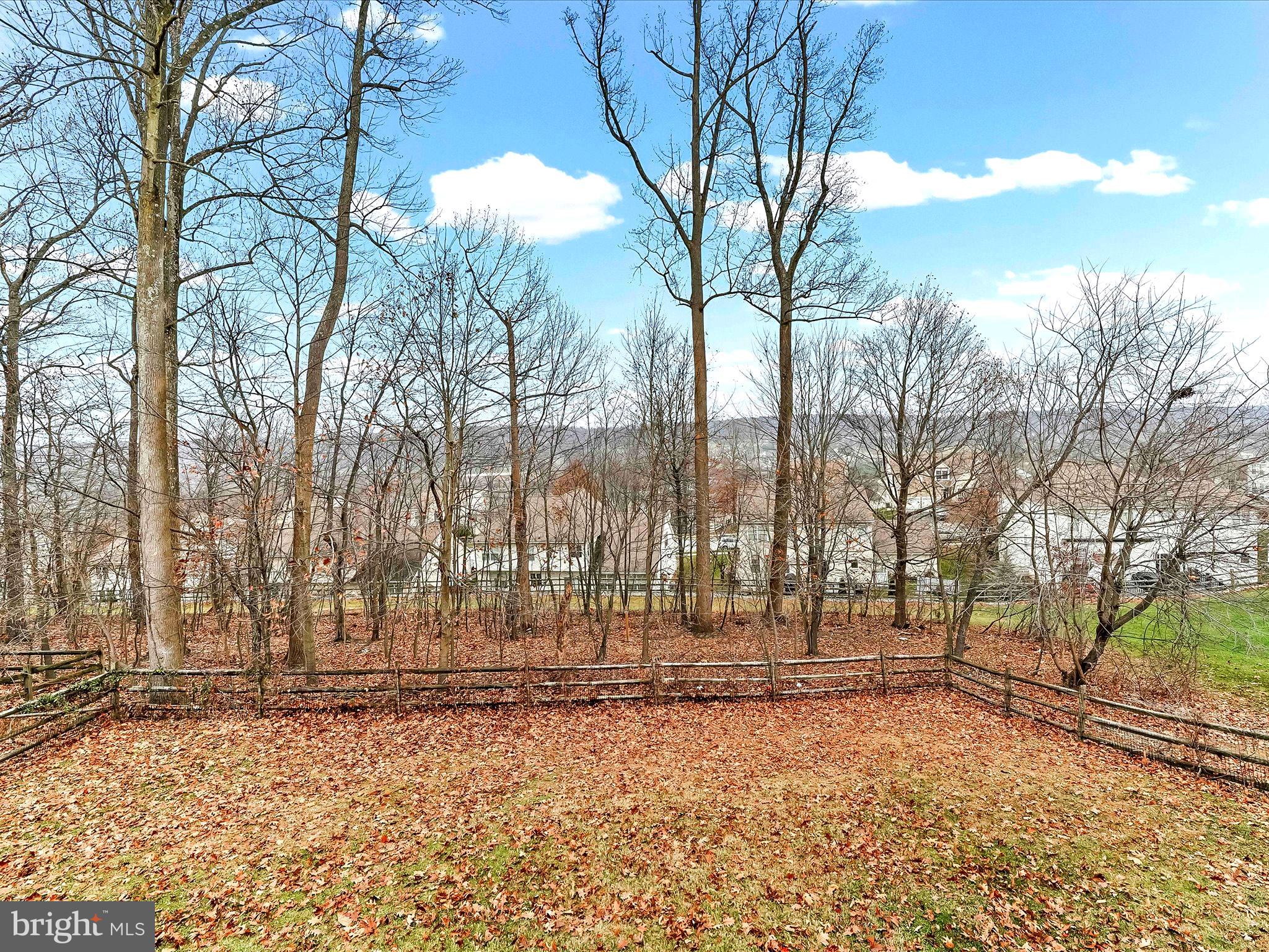 3033 Honeymead Road Downingtown, PA 19335 - Photo 10 of 47 a view of house with trees in the background