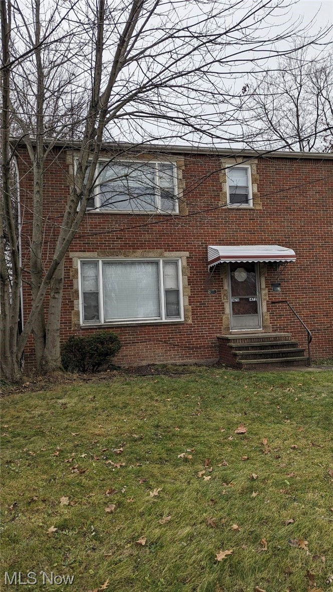 1470 Babbitt Road Euclid, OH 44117 - Photo 32 of 34 Front of house featuring a lawn