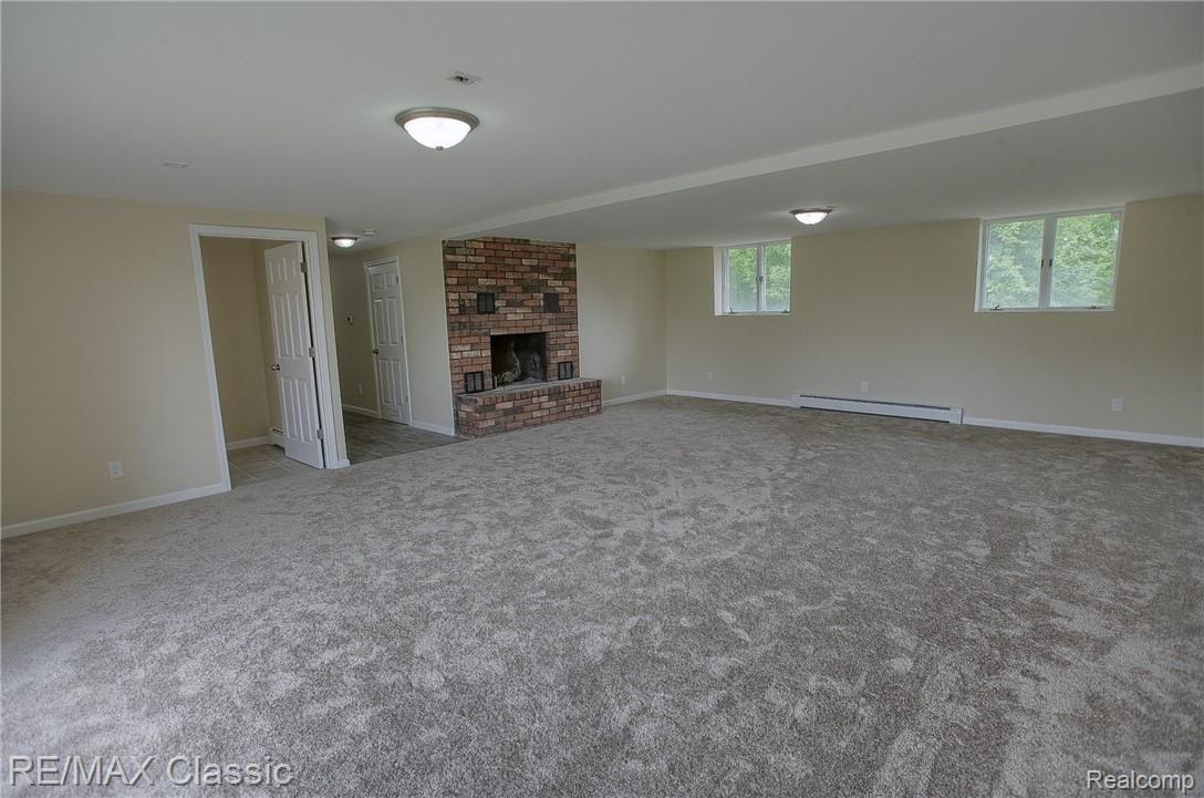 8661 Antcliff Road Howell, MI 48855 - Photo 20 of 38 Finished_Lower_Level_2nd_View.jpg