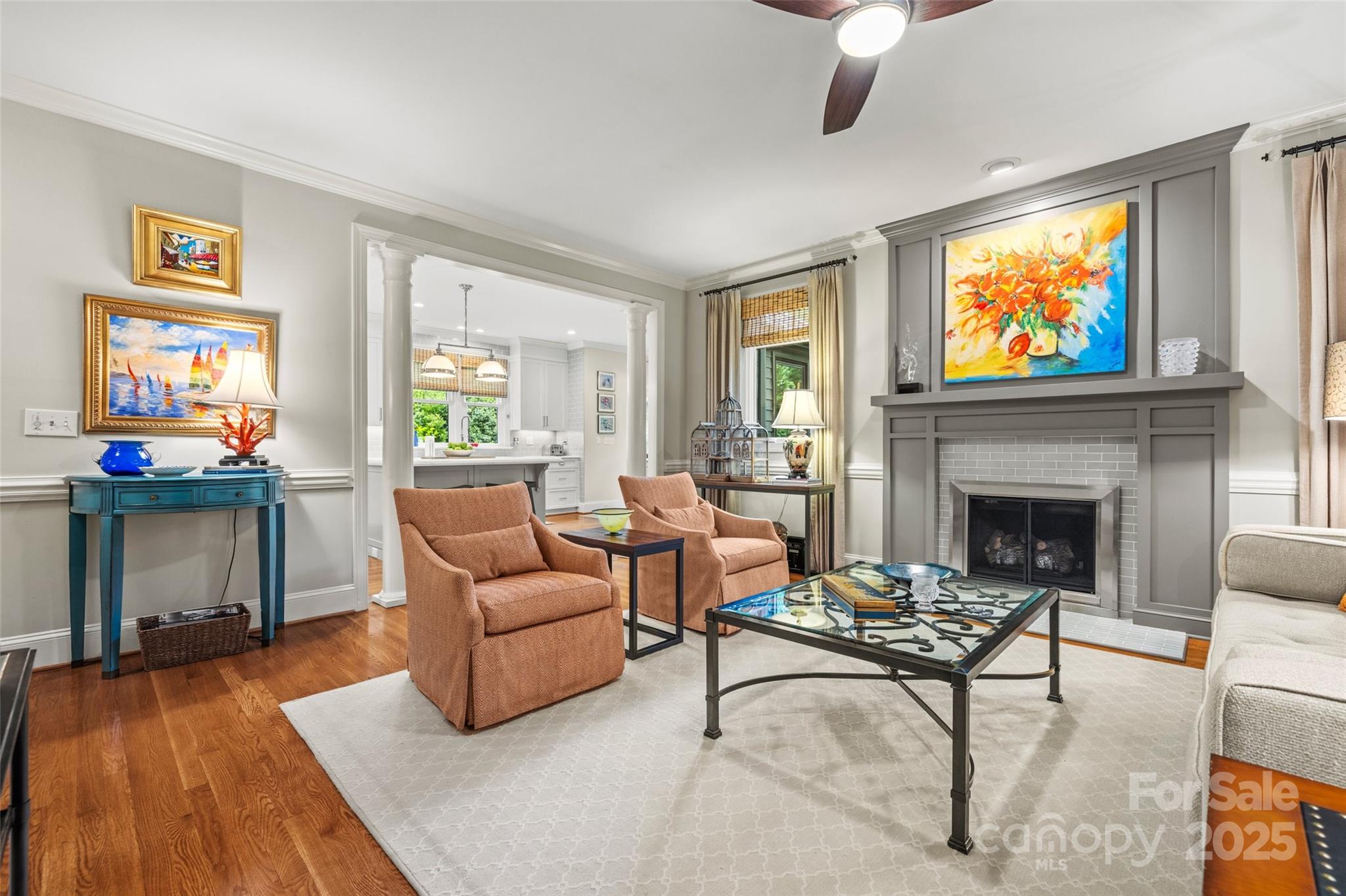 2329 Club Road Charlotte, NC 28205 - Photo 12 of 48 a living room with furniture a fireplace and a flat screen tv