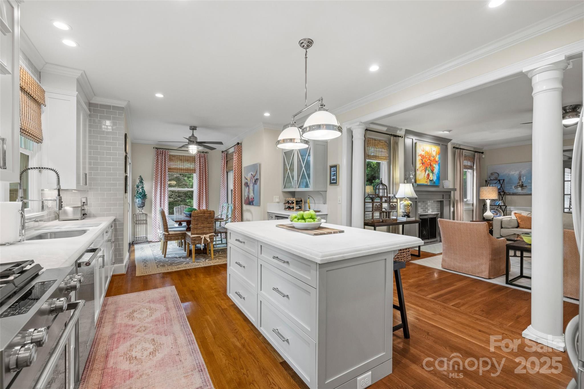 2329 Club Road Charlotte, NC 28205 - Photo 15 of 48 a large kitchen with stainless steel appliances granite countertop a stove and more cabinets