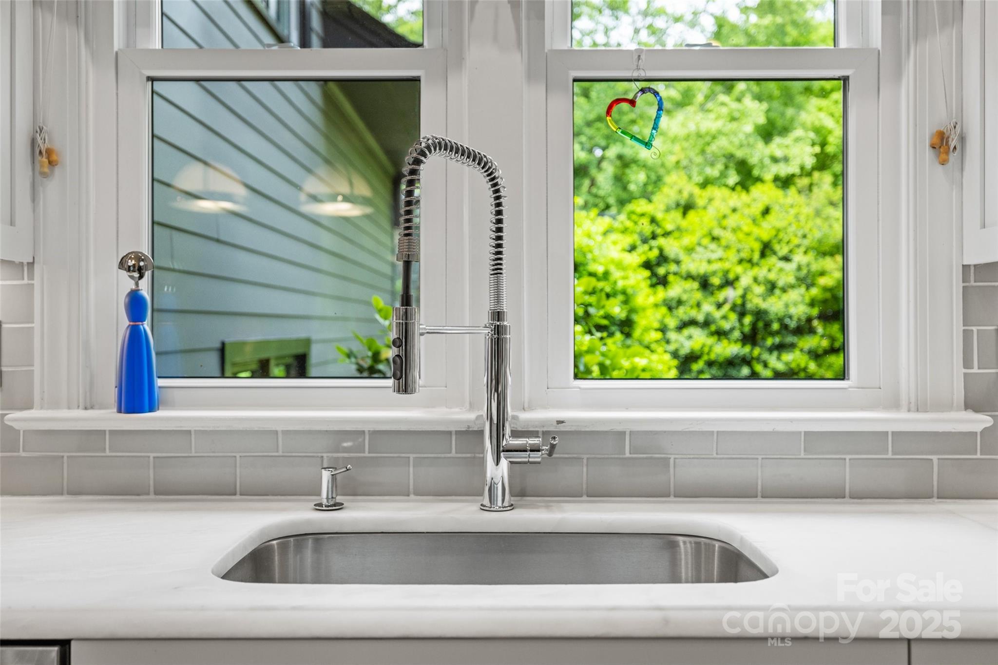 2329 Club Road Charlotte, NC 28205 - Photo 19 of 48 a close view of sink and a window