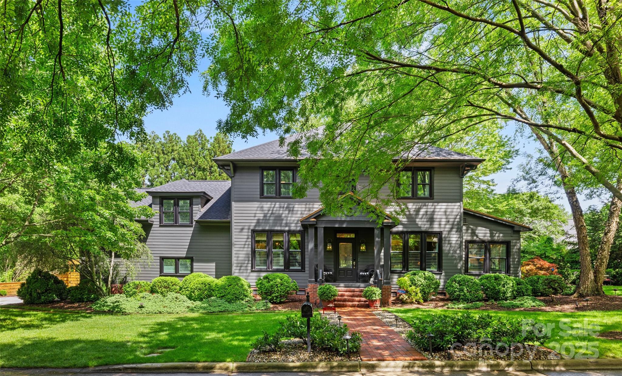 2329 Club Road Charlotte, NC 28205 - Photo 2 of 48 front view of a house with a yard