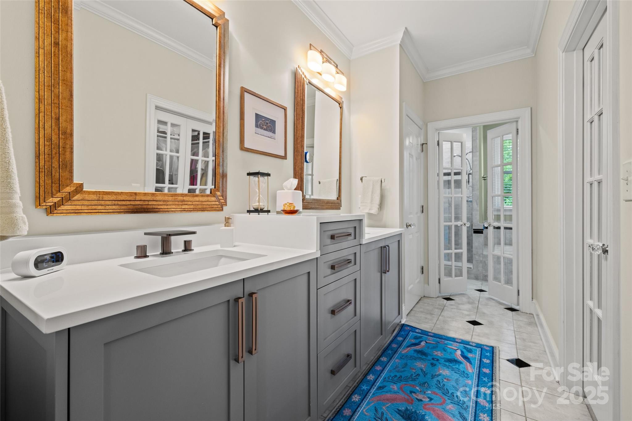 2329 Club Road Charlotte, NC 28205 - Photo 27 of 48 a spacious bathroom with double vanity a mirror a vanity and a shower