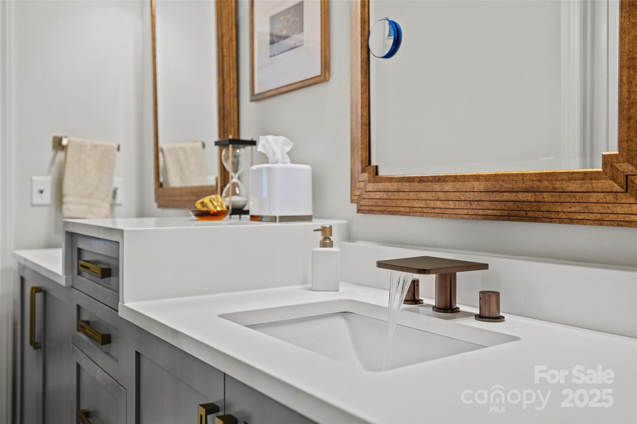 2329 Club Road Charlotte, NC 28205 - Photo 28 of 48 a bathroom with a sink and a mirror