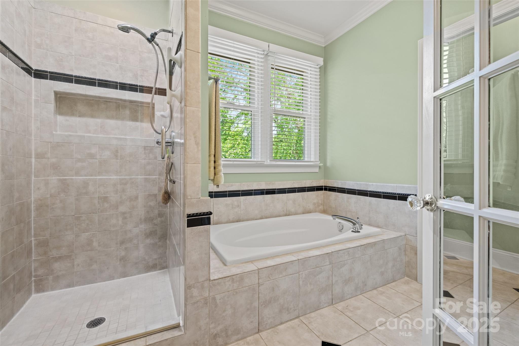 2329 Club Road Charlotte, NC 28205 - Photo 29 of 48 a white bath tub sitting next to a shower