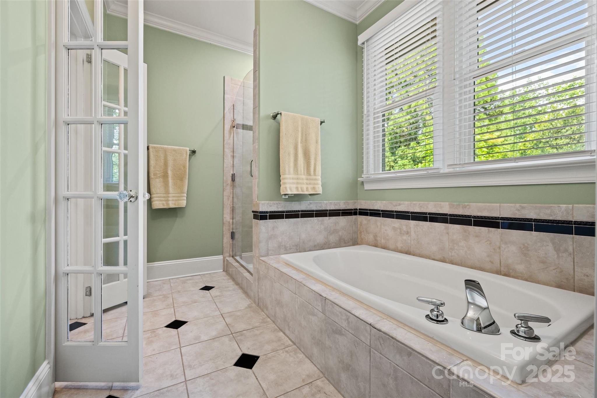 2329 Club Road Charlotte, NC 28205 - Photo 30 of 48 a bath tub sitting next to a window