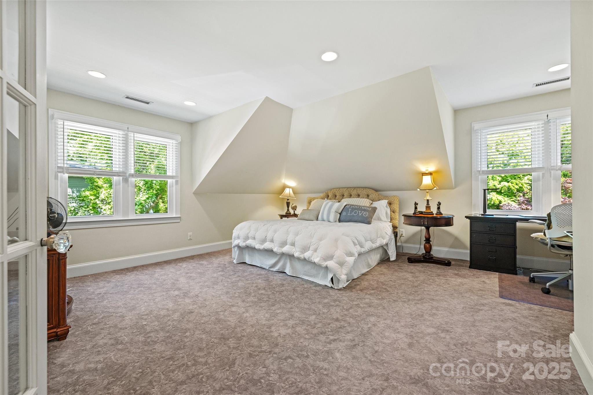 2329 Club Road Charlotte, NC 28205 - Photo 37 of 48 a bedroom with a bed and a window