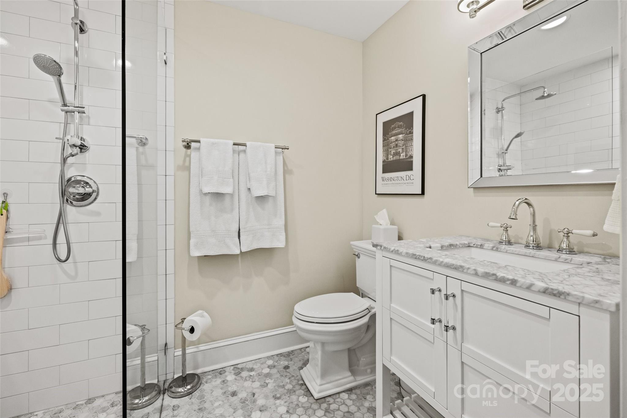 2329 Club Road Charlotte, NC 28205 - Photo 39 of 48 a bathroom with a granite countertop sink toilet and shower