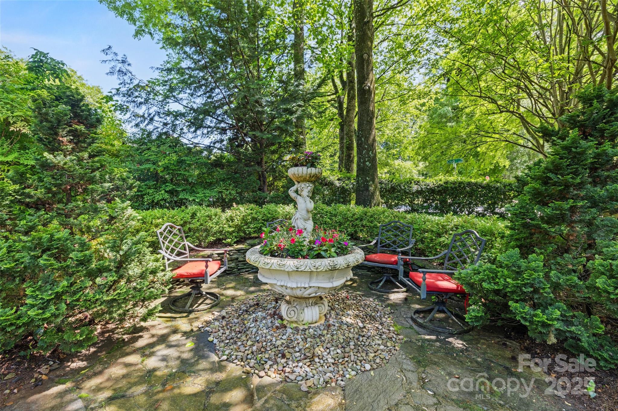 2329 Club Road Charlotte, NC 28205 - Photo 44 of 48 a backyard of a house with fire pit and outdoor seating