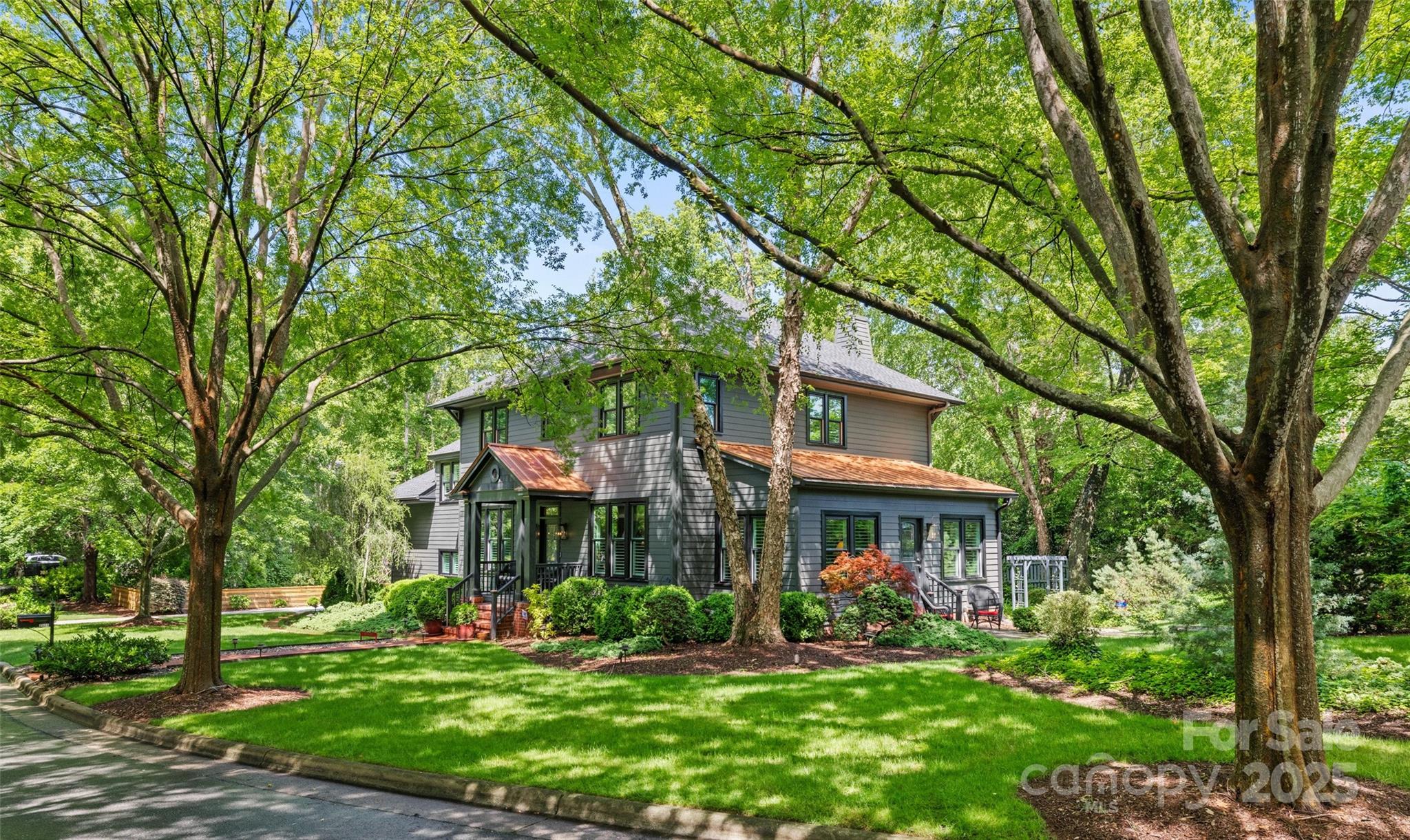 2329 Club Road Charlotte, NC 28205 - Photo 45 of 48 a front view of a house with a yard