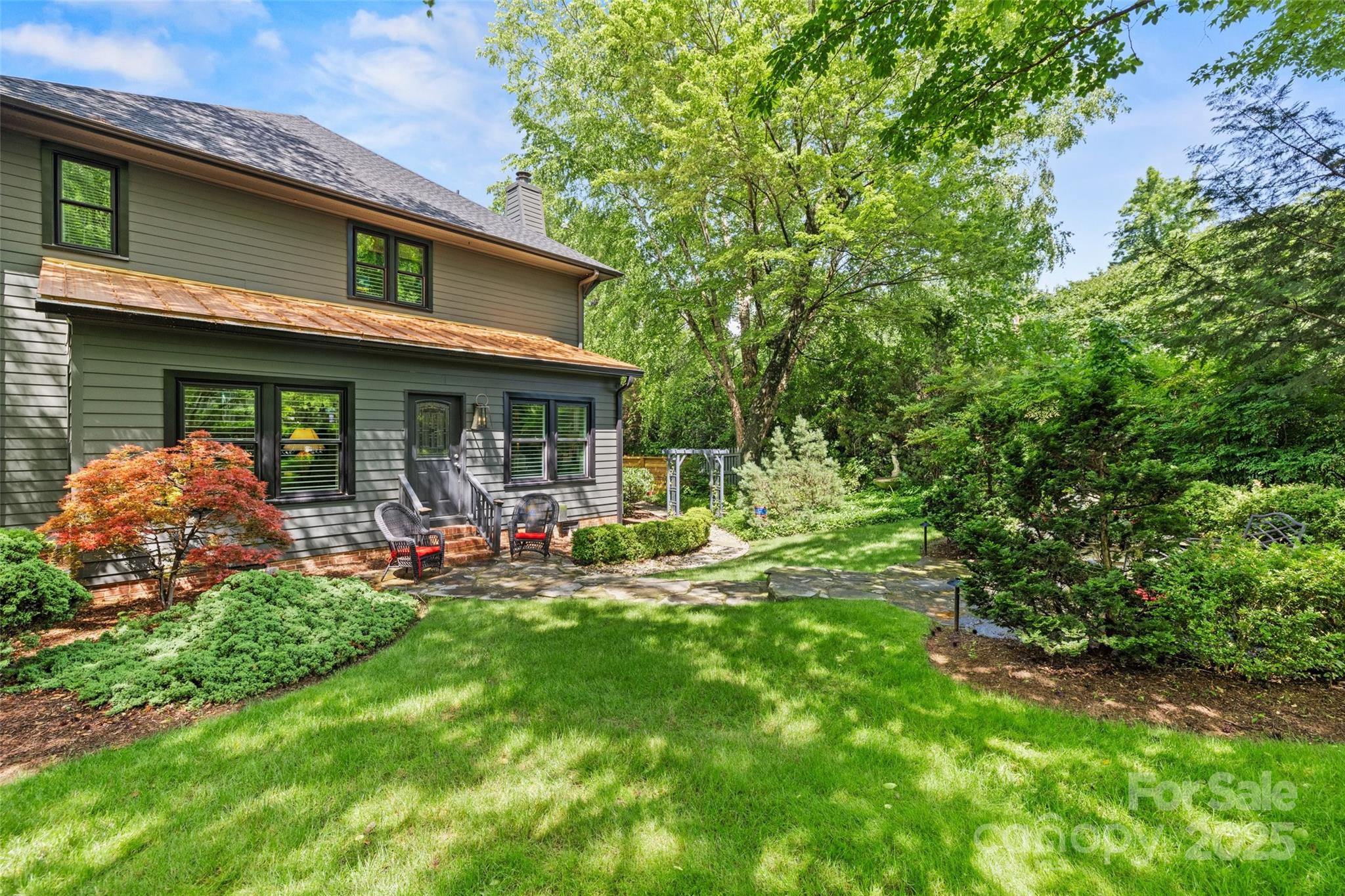 2329 Club Road Charlotte, NC 28205 - Photo 46 of 48 a front view of a house with patio
