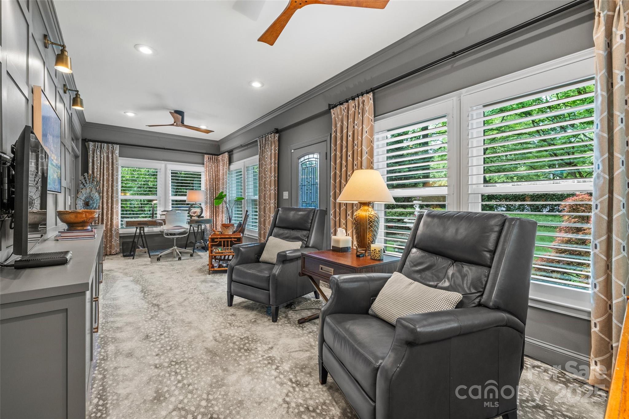 2329 Club Road Charlotte, NC 28205 - Photo 8 of 48 a living room with furniture and a flat screen tv