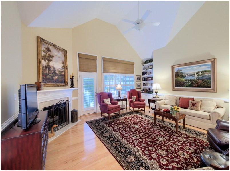 9012 Carrington Ridge Drive Raleigh, NC 27615 - Photo 11 of 22 The family room has lots of light and soaring ceilings. Family Room