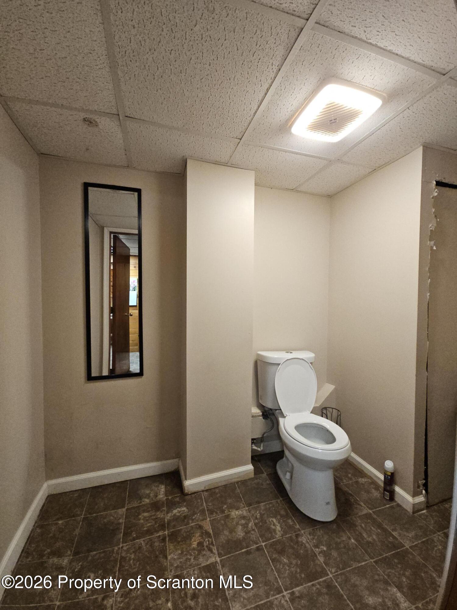 405 Baker Street Taylor, PA 18517 - Photo 33 of 36 a bathroom with a toilet