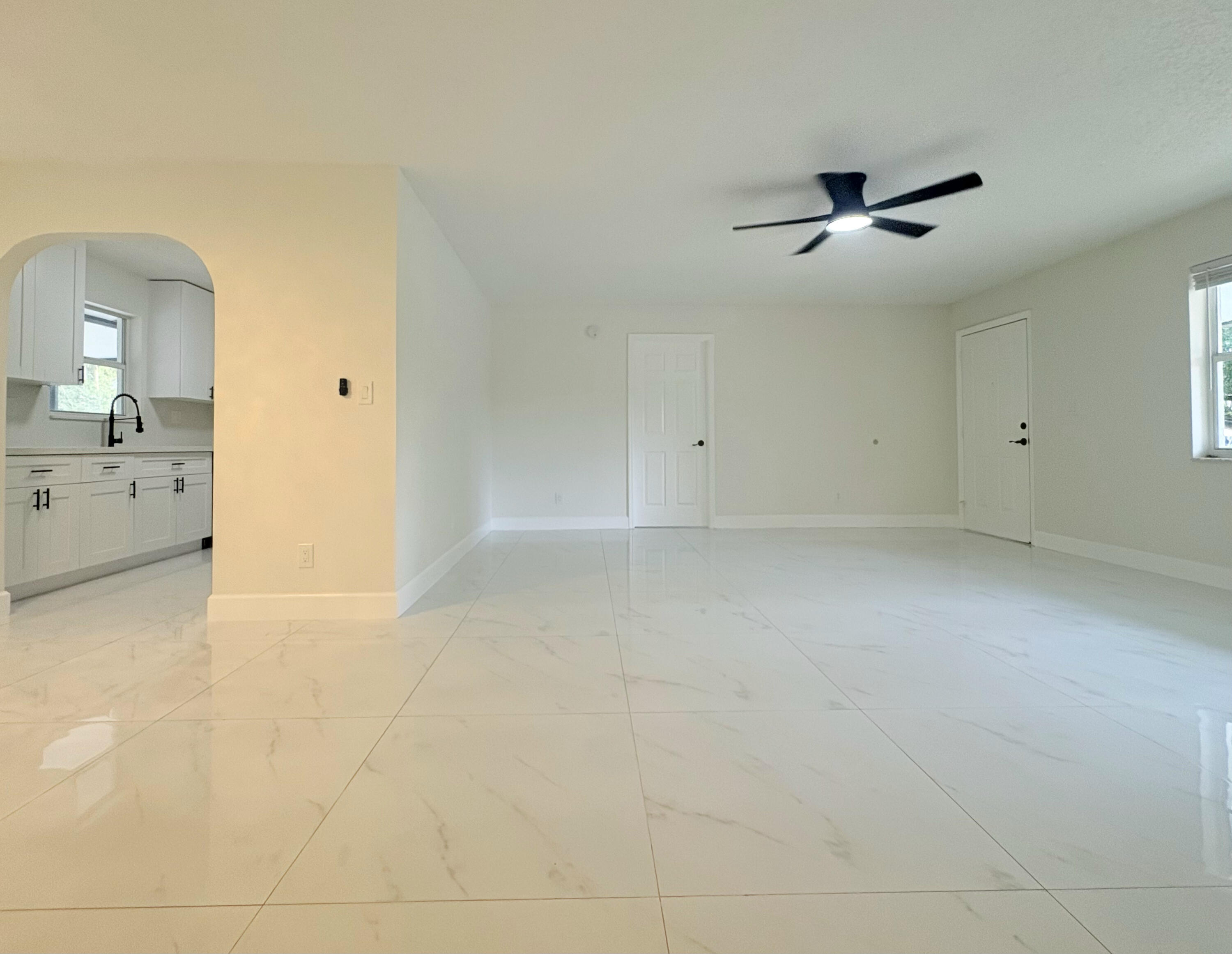 14523 Flamingo Road Loxahatchee Groves, FL 33470 - Photo 11 of 50 a view of a livingroom with kitchen appliances