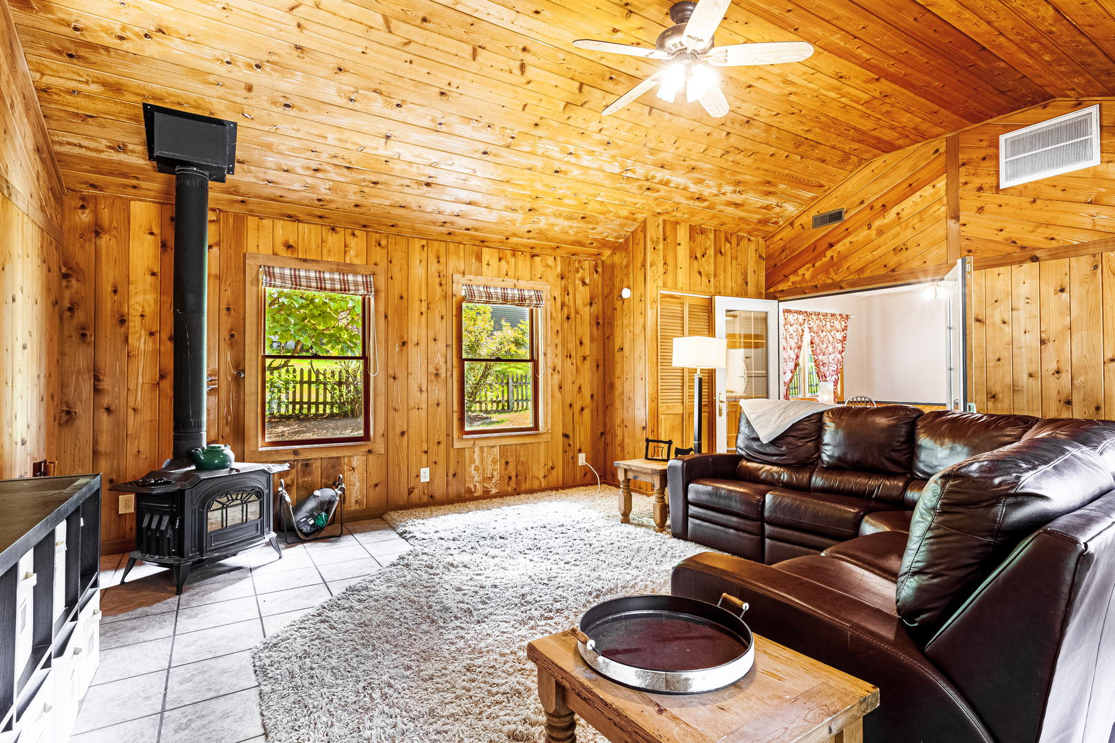 16176 Strawberry Road Morrison, IL 61270 - Photo 11 of 42 a living room with furniture and a floor to ceiling window