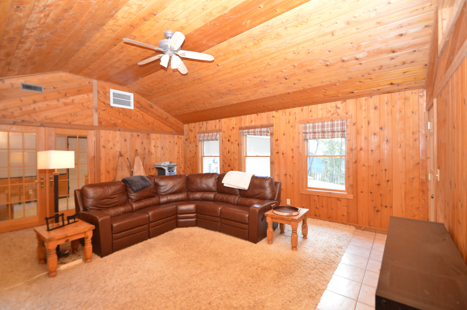 16176 Strawberry Road Morrison, IL 61270 - Photo 13 of 42 a living room with furniture and a large window