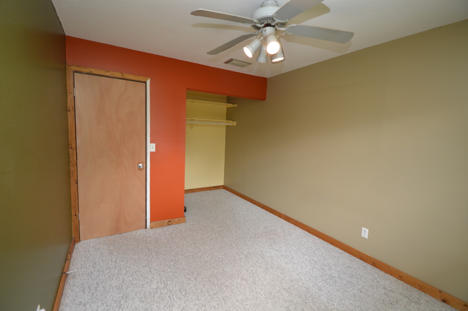 16176 Strawberry Road Morrison, IL 61270 - Photo 19 of 42 an empty room with a chandelier fan and closet area