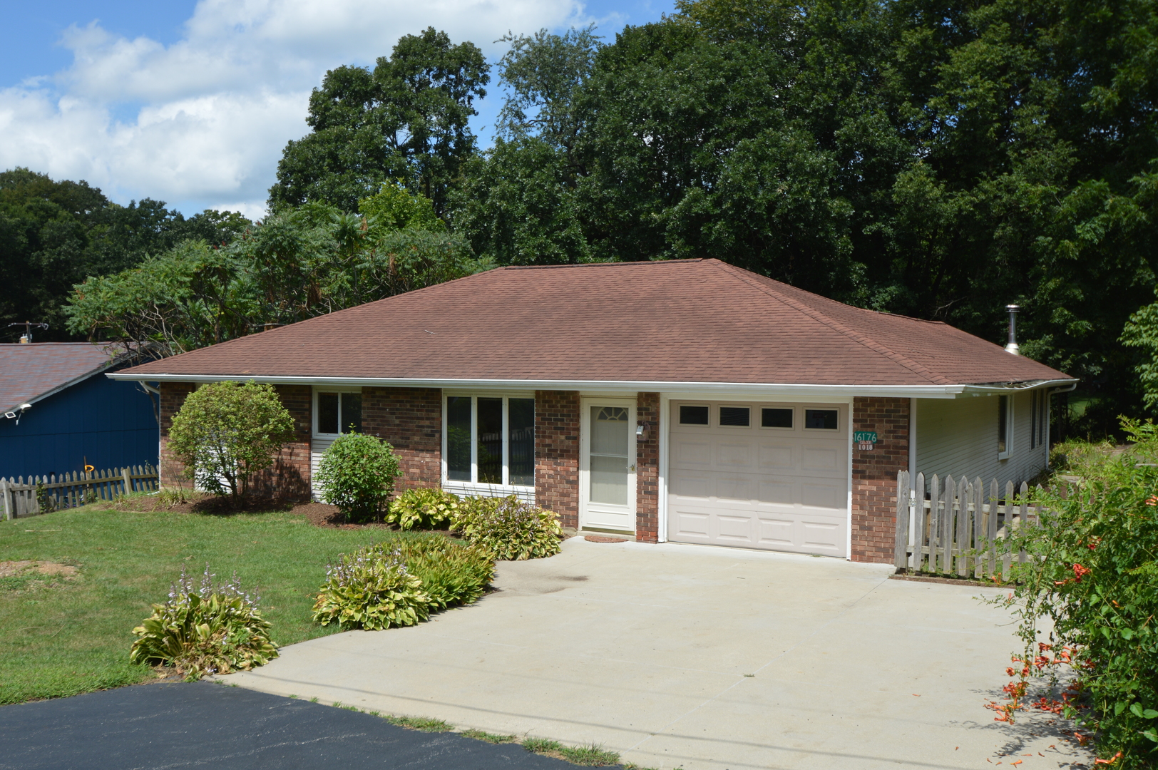 16176 Strawberry Road Morrison, IL 61270 - Photo 24 of 42 a house with a garden view