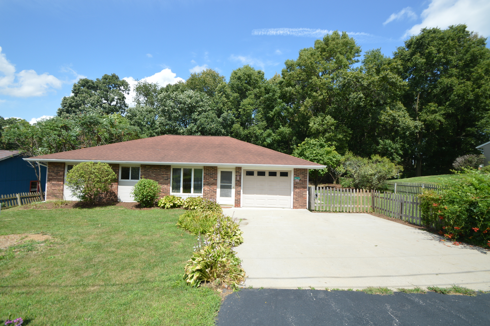 16176 Strawberry Road Morrison, IL 61270 - Photo 26 of 42 a house view with a garden space