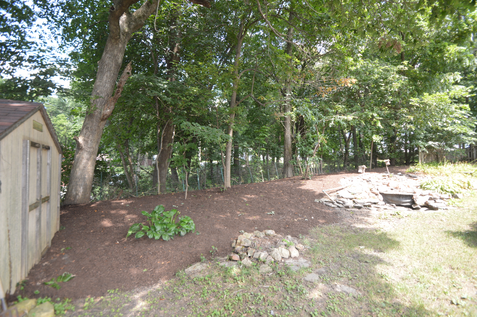 16176 Strawberry Road Morrison, IL 61270 - Photo 27 of 42 a view of a yard with trees in front of it