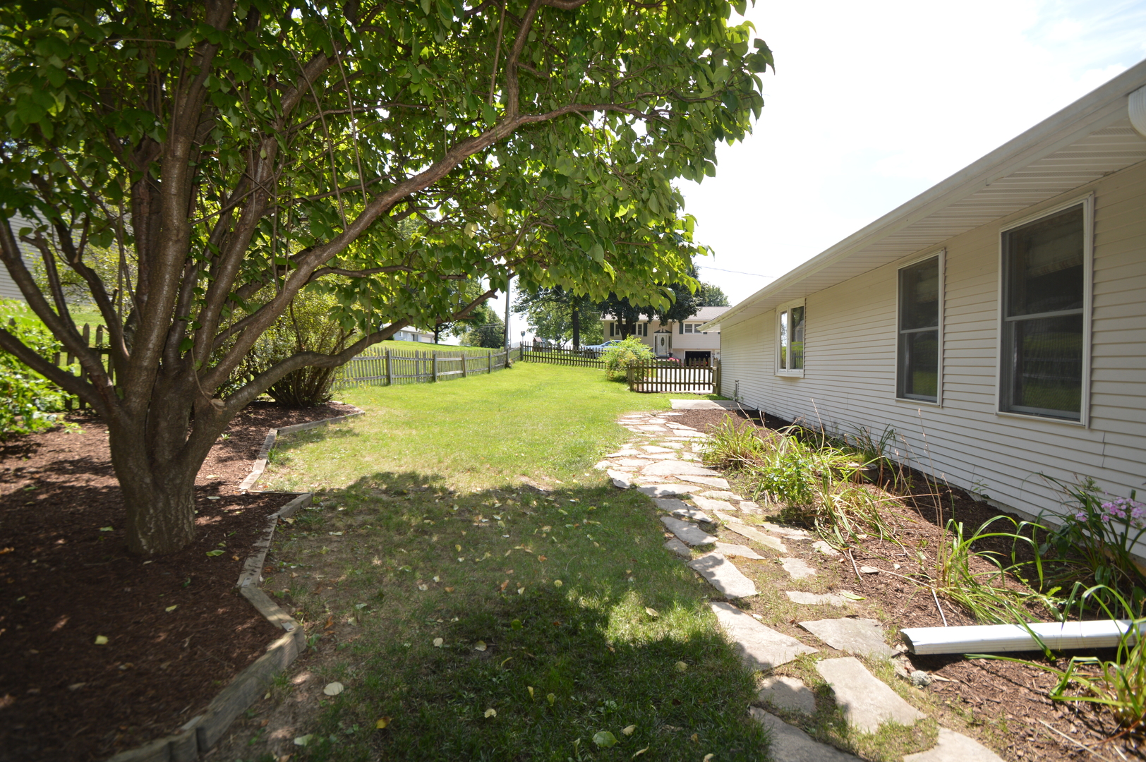 16176 Strawberry Road Morrison, IL 61270 - Photo 33 of 42 a view of a backyard with large trees