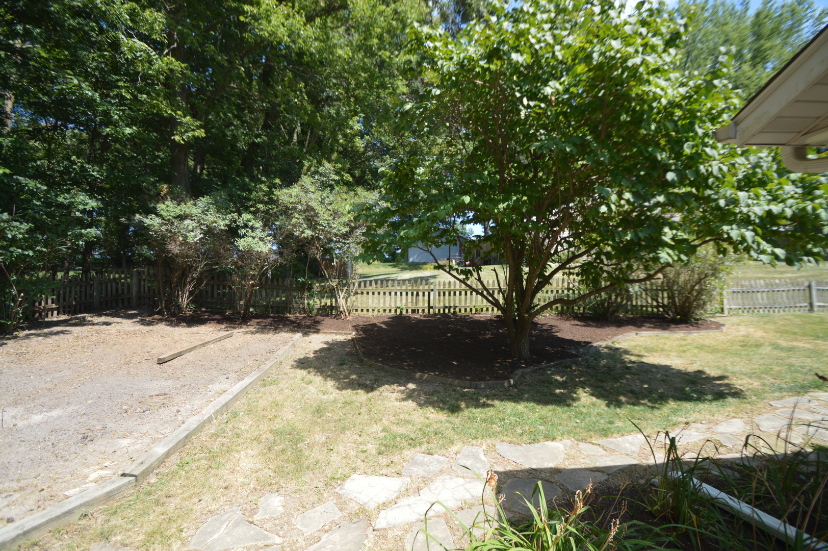 16176 Strawberry Road Morrison, IL 61270 - Photo 40 of 42 a view of a yard with plants and trees