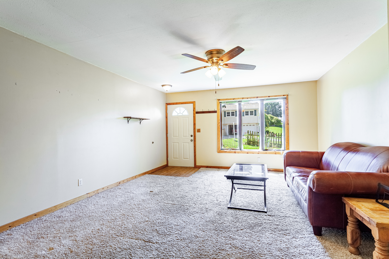 16176 Strawberry Road Morrison, IL 61270 - Photo 5 of 42 a living room with furniture and a large window