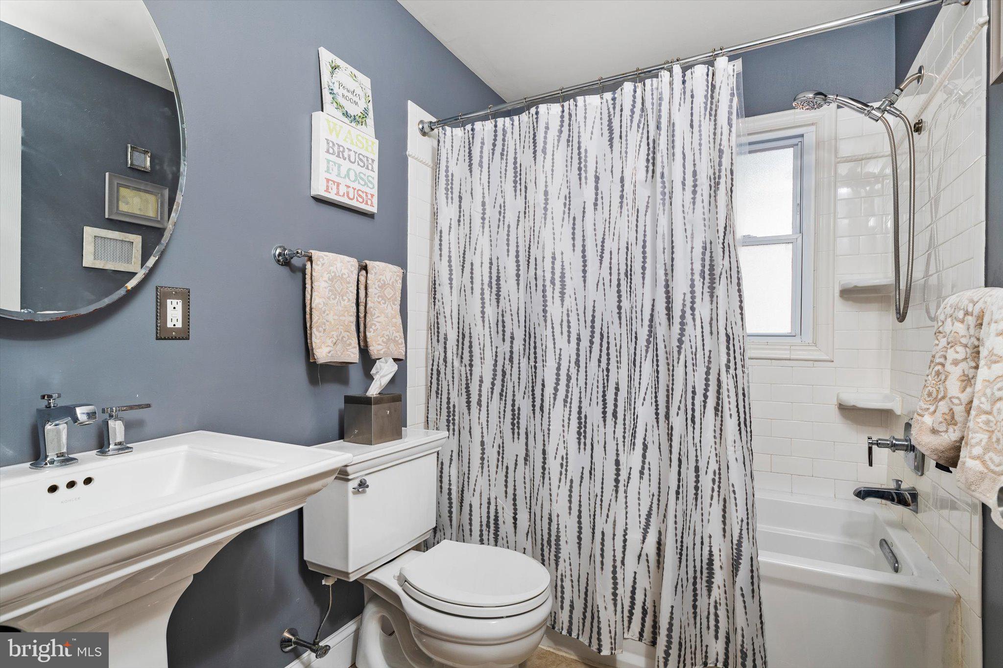 15 Decou Avenue Ewing, NJ 08628 - Photo 14 of 33 a bathroom with a sink toilet and shower