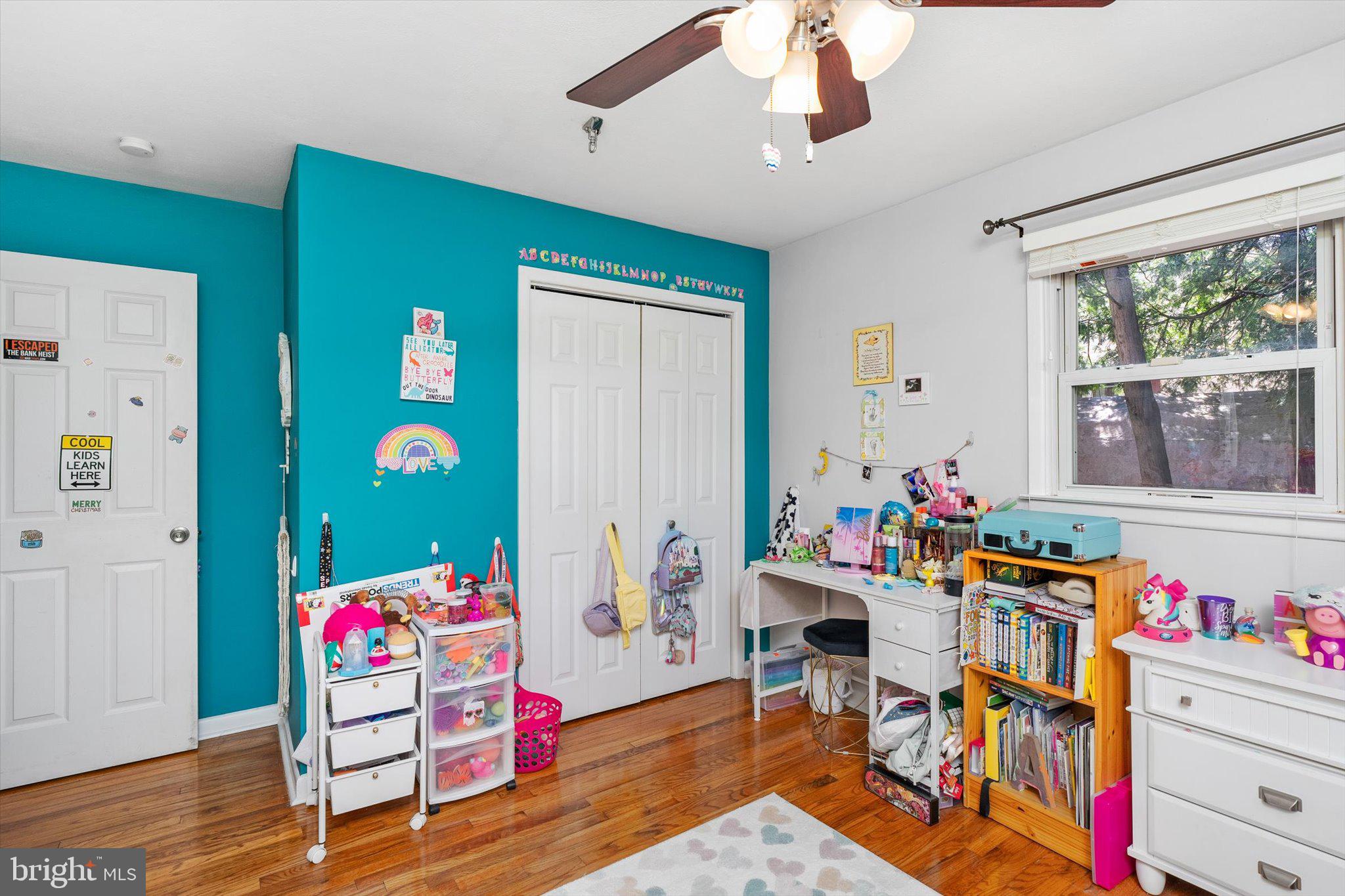 15 Decou Avenue Ewing, NJ 08628 - Photo 22 of 33 a living room filled with furniture and wooden floor