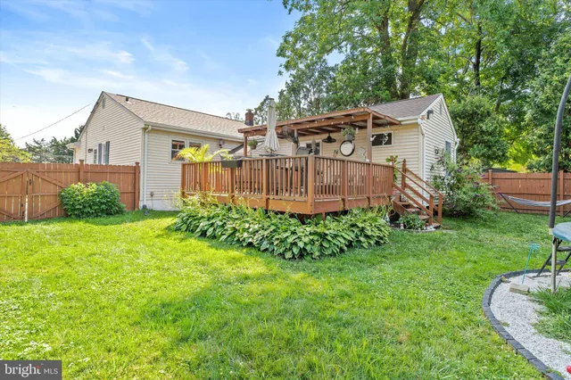 a view of a back yard with green space