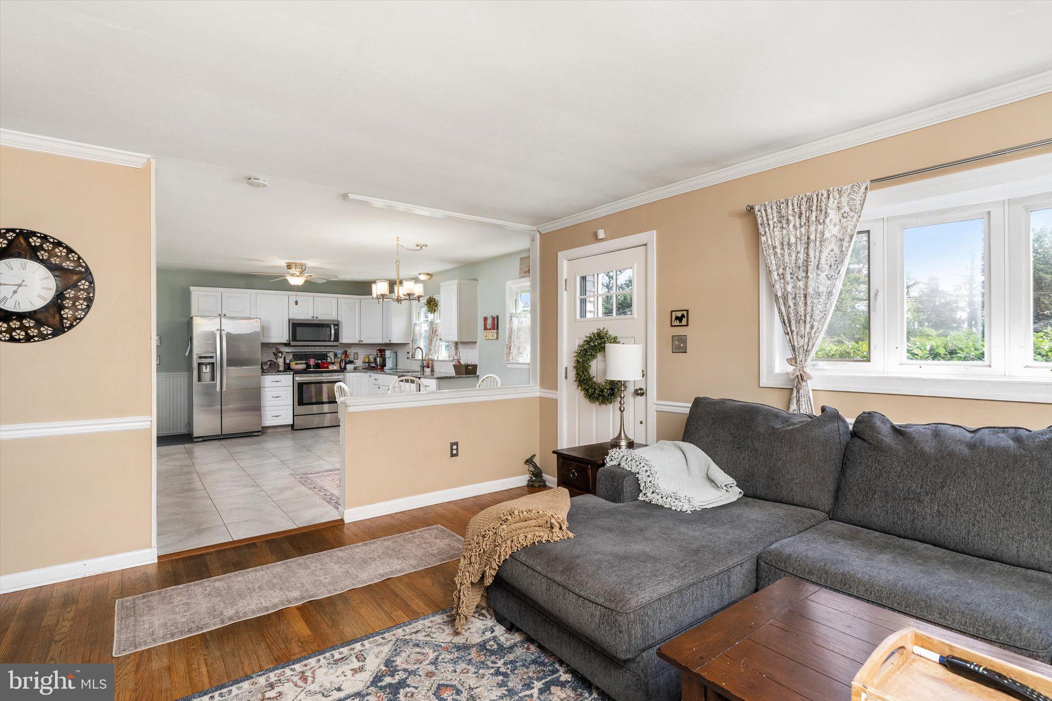 15 Decou Avenue Ewing, NJ 08628 - Photo 9 of 33 a living room with furniture and a large window