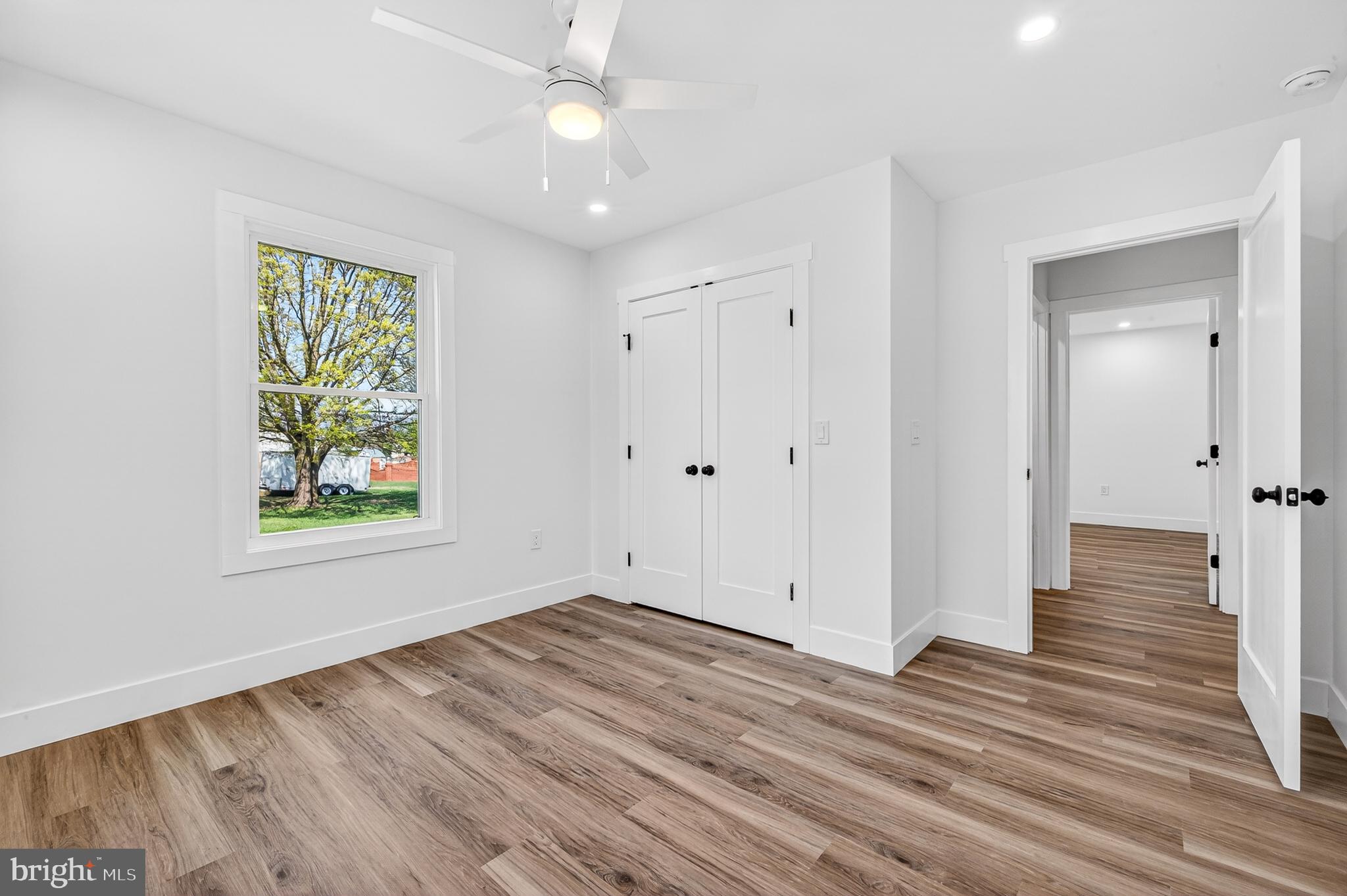 551 Park Road Stanley, VA 22851 - Photo 39 of 83 wooden floor in an empty room with a window