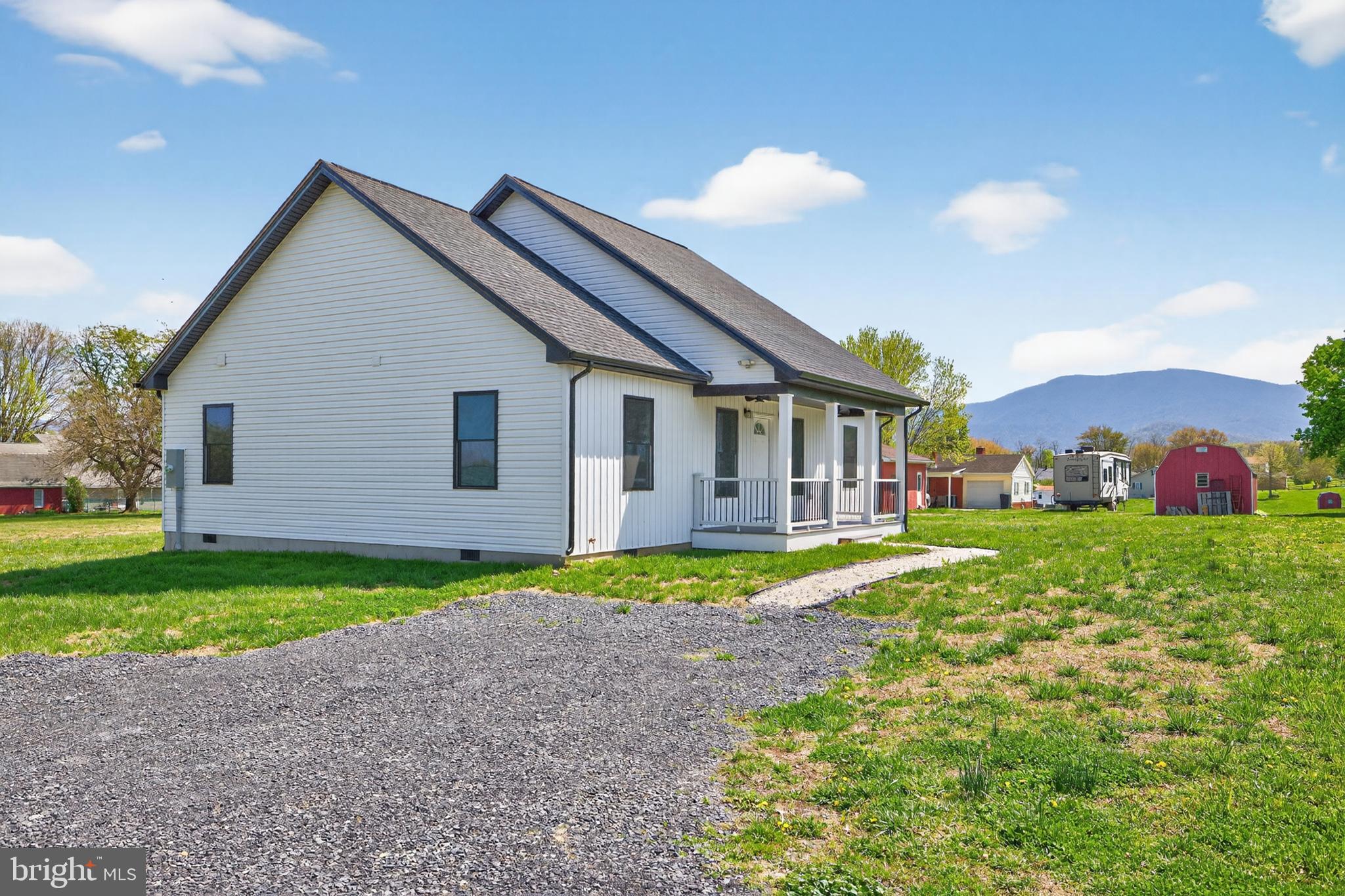 551 Park Road Stanley, VA 22851 - Photo 46 of 83 a view of a house with a yard and plants