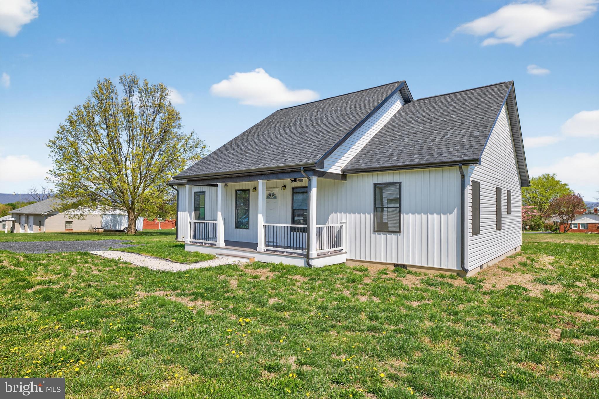 551 Park Road Stanley, VA 22851 - Photo 49 of 83 a view of a house with a yard and sitting area