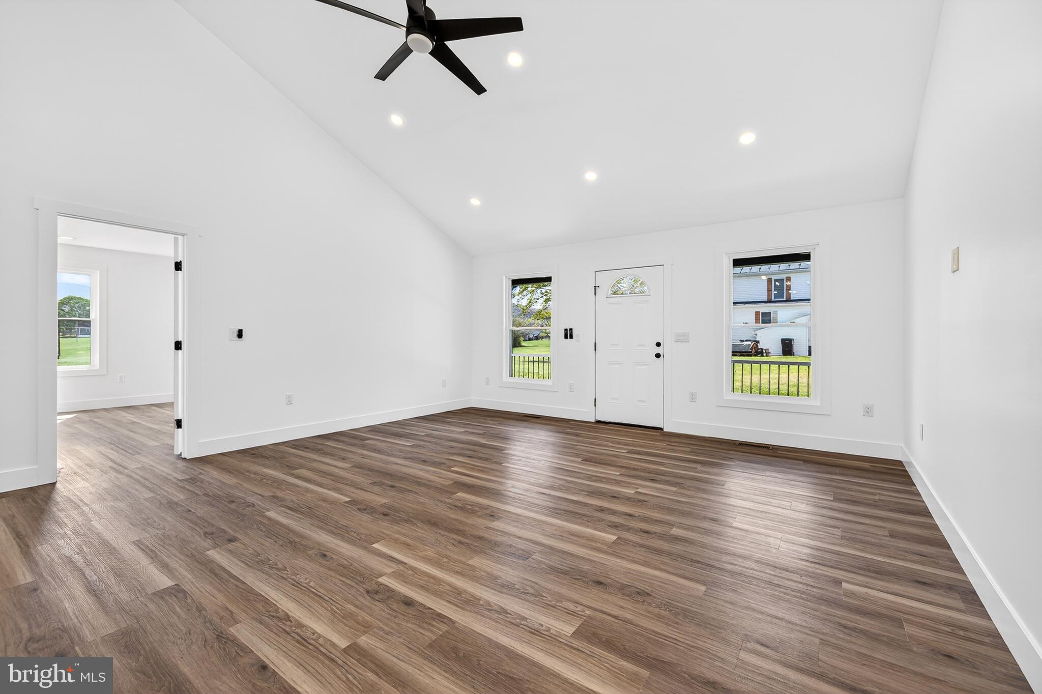551 Park Road Stanley, VA 22851 - Photo 6 of 83 an empty room with wooden floor and windows