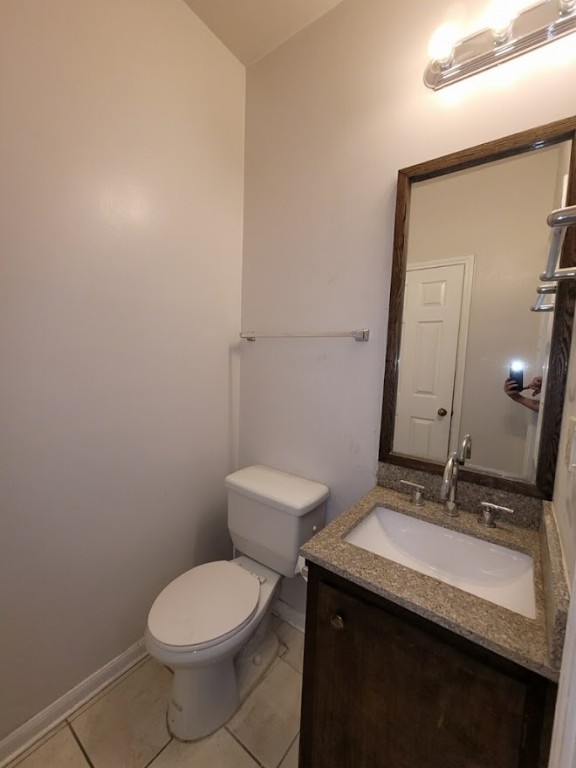 2529 Rio Grande Street, Unit 20 Austin, TX 78705 - Photo 14 of 19 a bathroom with a granite countertop sink toilet and mirror