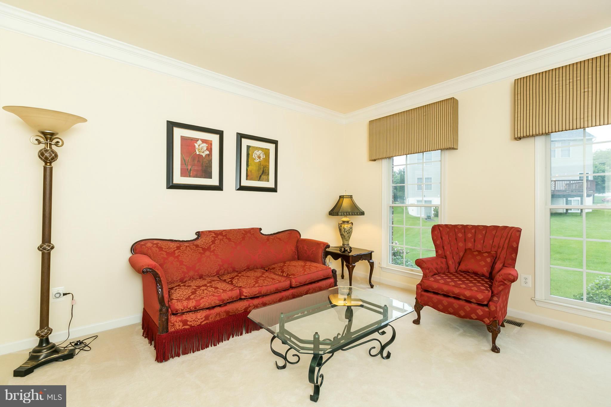 5052 Jericho Road Columbia, MD 21044 - Photo 4 of 30 Living Room w/ crown molding