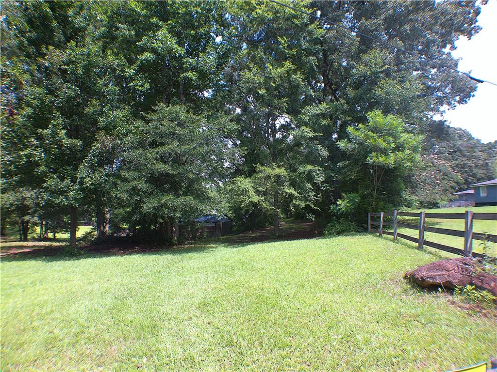 0 Mt Tabor Road Oxford, GA 30054 - Photo 5 of 8 a view of green field with trees in the background